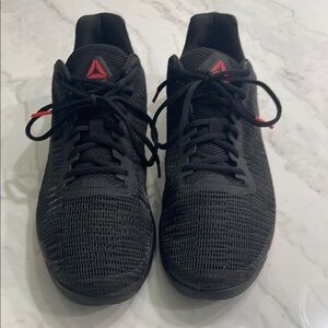 Reebok Black Mesh Performance Trainers with Red bottoms